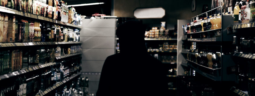 man in dark store